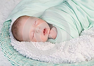 Sweet wrapped in a nappy newborn baby