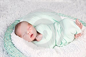 Sweet wrapped in a nappy newborn baby
