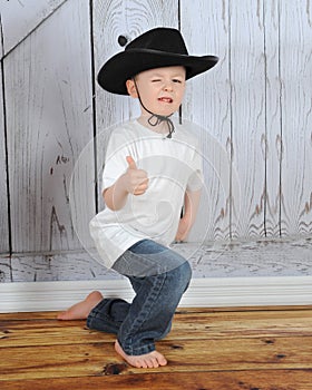 Sweet young cowboy being playful