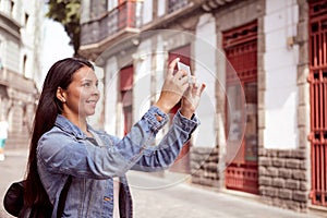 Sweet young girl with cell phone