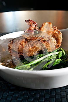 Sweetbreads over fresh greens