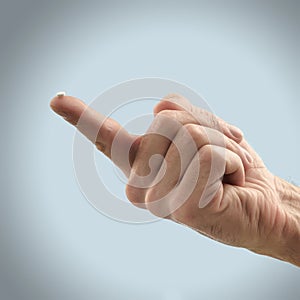 Sweetener tablet on fingertip