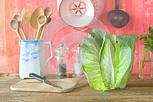 Sweetheart cabbage and kitchen utensils