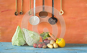 Sweetheart cabbage with kitchen utensils