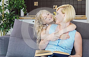 Sweetheart Smiling Daughter Hugs Her Loving Mother