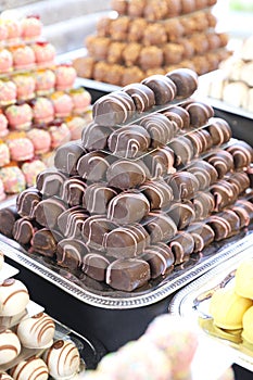 Sweetness balls build as a pyramid for sle in a pastry shop