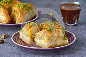 Sweets arabic dessert kunefe, kunafa, knafeh with pistachio and cheese