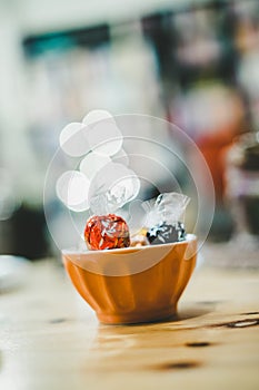 Sweets in bowl, Christmas time, blurry background