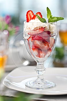Sweets cake cream with strawberries. Photo of food on a white background
