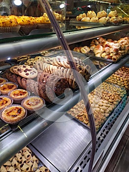 Sweets and confectionary goods in a display window of a bakery in Sao Paulo photo