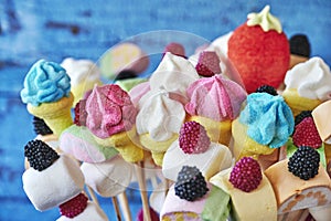 Sweets made from marshmallows arranged like a bouquet of flowers