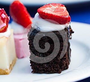 Sweets on a plate, a cake with fruit