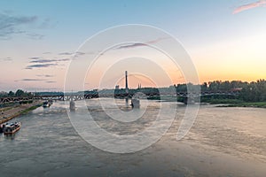 Swietokrzyski Bridge over Vistula river at sunrise time in Warsaw, Poland