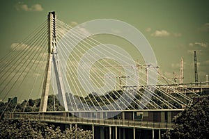 Swietokrzyski bridge on Vistula river in Warsaw. photo
