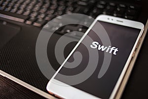 Swift Programming language for mobile development, concept. Smartphone
