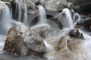 Swift torrent in High Tatras mountains photo