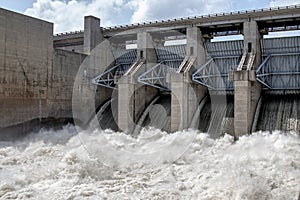 Swift water of Truman dam at Warasaw Missouri USA photo