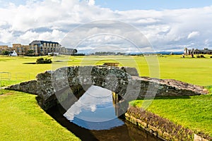 The Swilcan Bridge, or Swilken Bridge, a famous small stone bridge spanning the Swilcan Burn in St Andrews Links golf course,