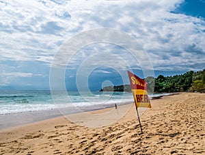 Swim here. Safety warning signs for tourists. Blackground with