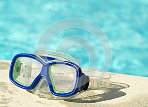 Swim mask by the pool