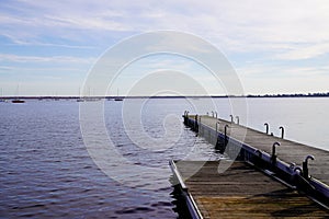 Swim raft floating dock wooden pontoon on lake of Maubuisson Carcans France