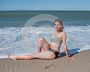 Swim suit model leaning back