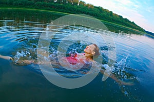 Swiming in a river with clean water