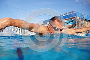 Swimmer in the big swimming pool