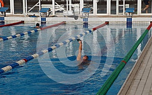 Swimmer in the big swimming pool