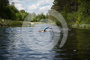 Swimmer in a channel