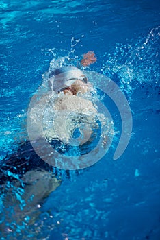 Swimmer excercise on indoor swimming poo