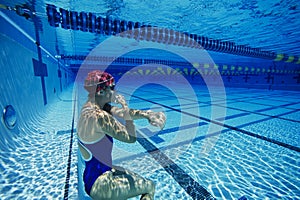 Swimmer Holding Breath Underwater