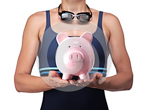 Swimmer holding a piggy bank