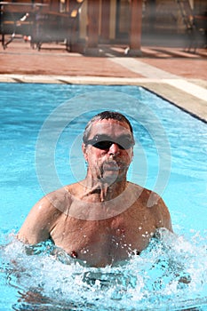 Swimmer in a hotel's pool