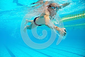 Swimmer in the outdoor swimming pool