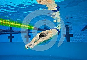 Swimmer in Pool Underwater