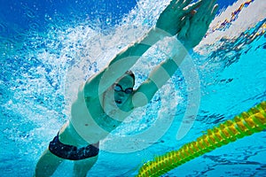 Swimmer in Pool Underwater