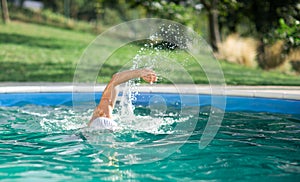 Swimmer recreating on outdoor