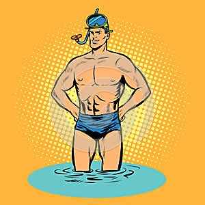 Swimmer in swimming trunks and mask for scuba diving