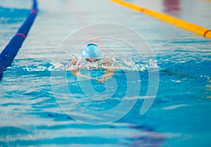 Swimmer swims in water