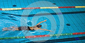 Swimmer using breaststroke drills during a swim training session