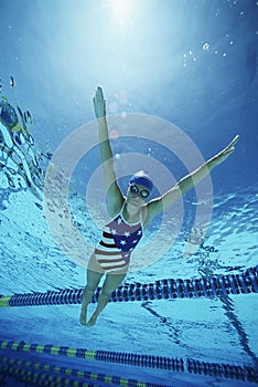 Swimmer Wearing U.S Swimsuit In Pool