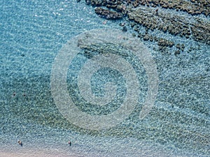 Swimmers, bathers floating on the water. Aerial view photo