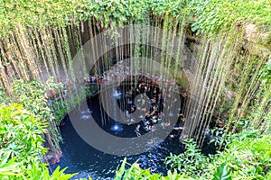 Swimming at Cenote Ik Kil in Yucatan, Mexico