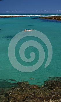 Swimming in crystalline clear sea photo