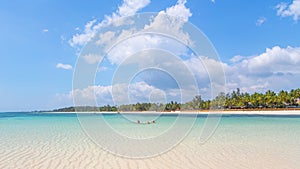 Swimming in the Diani Beach in Kenya