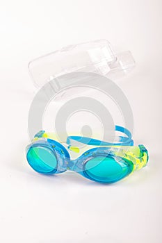 Swimming goggles isolated on the bright background photo