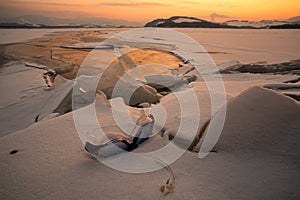 Swimming googles and frozen lake