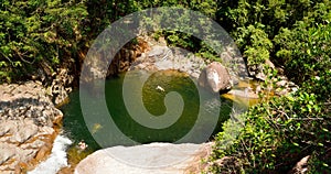 Swimming hole at Wheel of Fire falls in Eungella National Park i photo