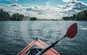 Swimming on kayaks. Rear view of kayaking on Desna river